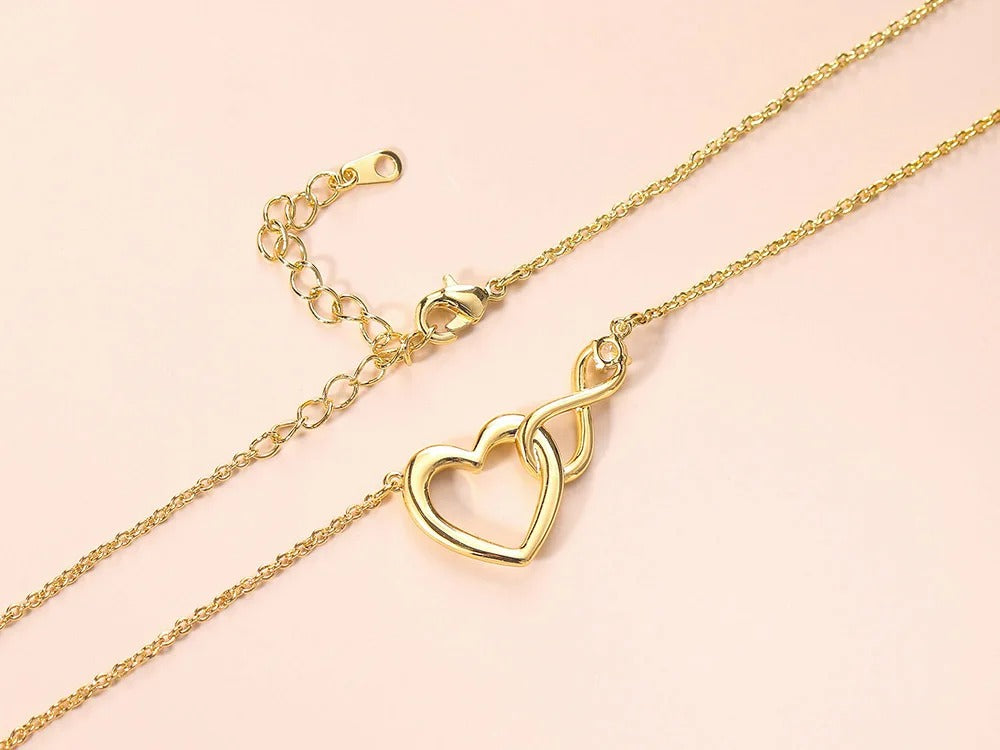 HeartBond Necklace – Intertwined Hearts Pendant