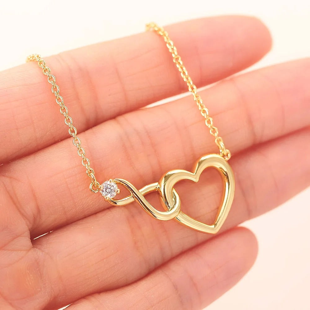HeartBond Necklace – Intertwined Hearts Pendant