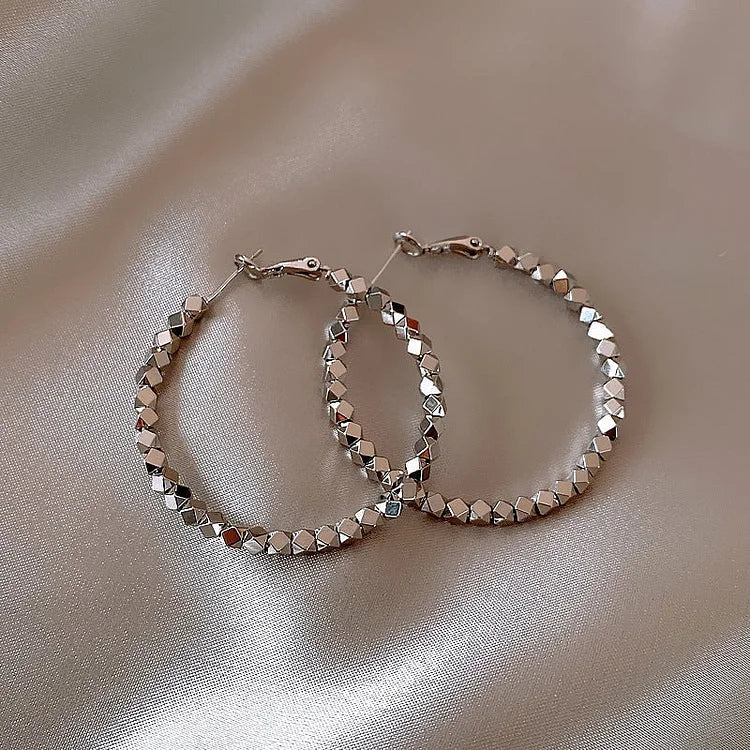 Nina - Faceted Hoop Earrings in Gold and Silver for Women