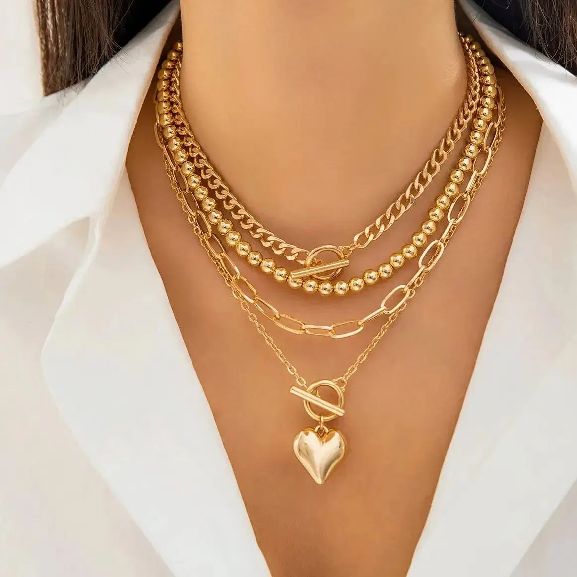 HeartGleam Necklace Set – Gold Heart Pendants