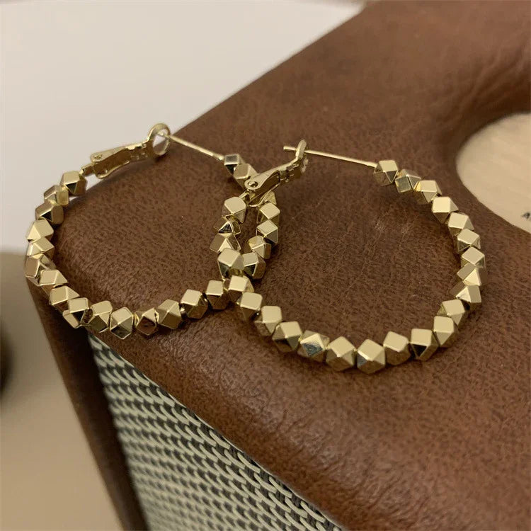 Nina - Faceted Hoop Earrings in Gold and Silver for Women