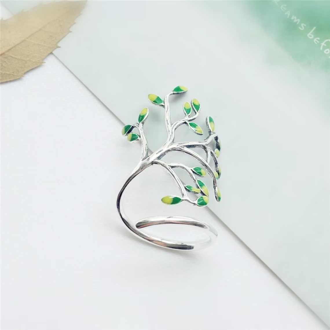 SilverLeaf Ring - Elegant Adjustable Silver Ring with Green Leaf Details