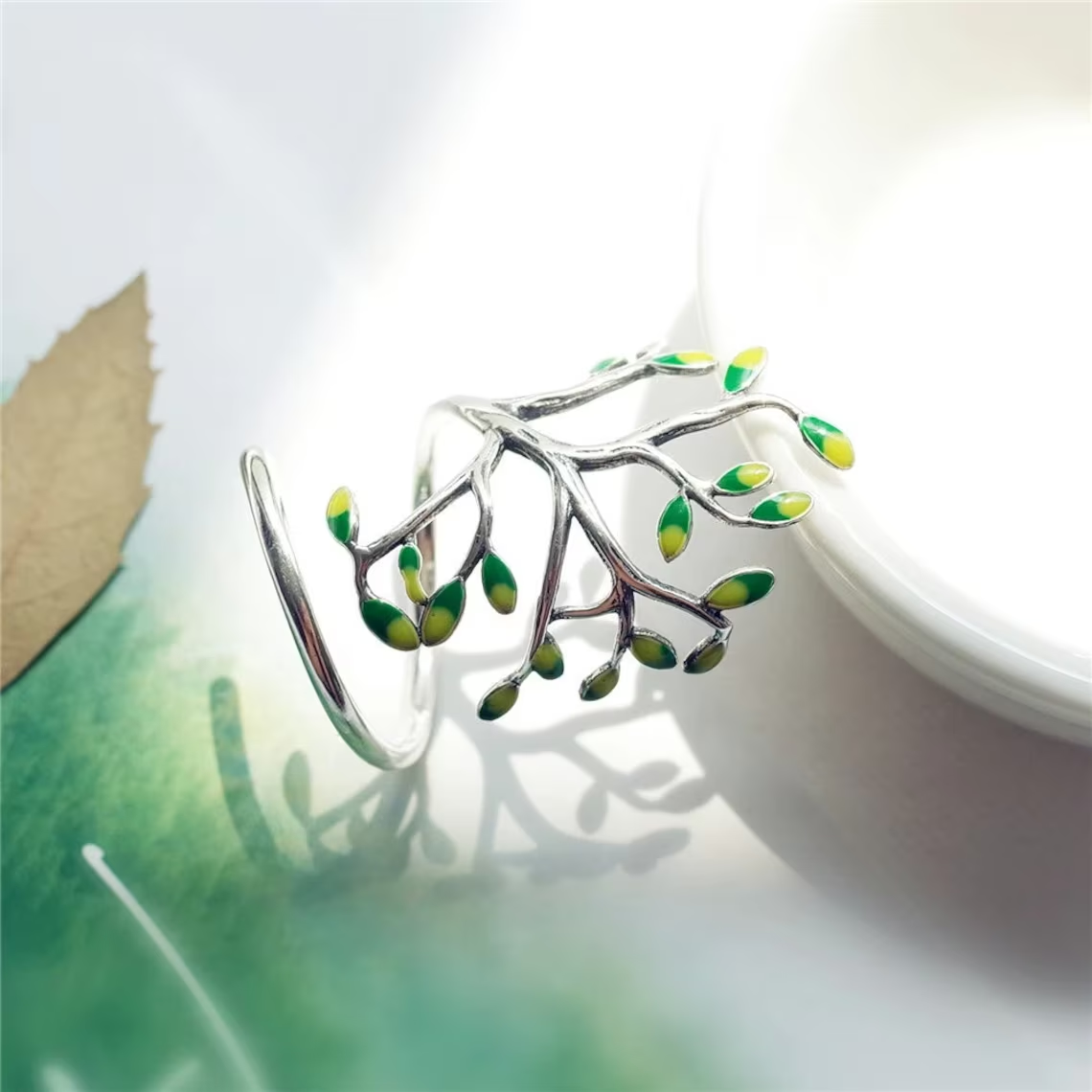 SilverLeaf Ring - Elegant Adjustable Silver Ring with Green Leaf Details