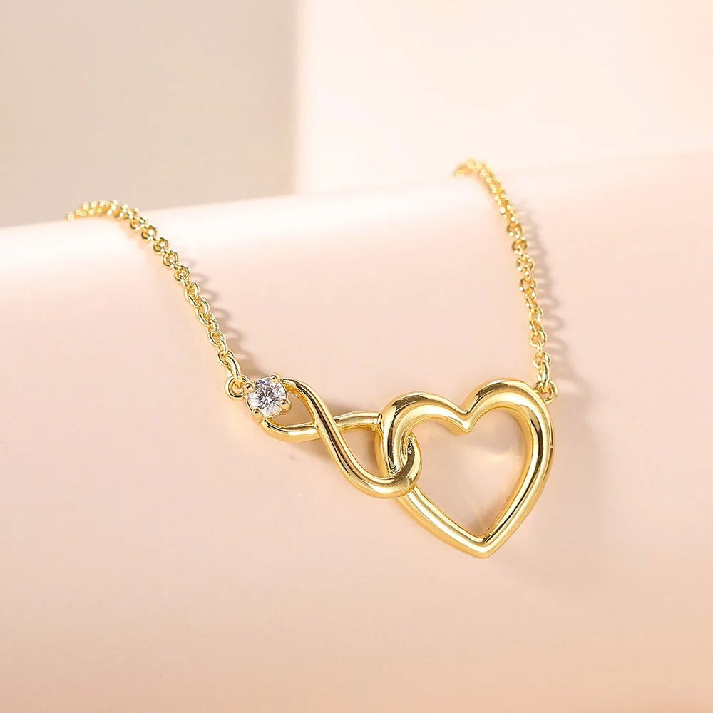 HeartBond Necklace – Intertwined Hearts Pendant