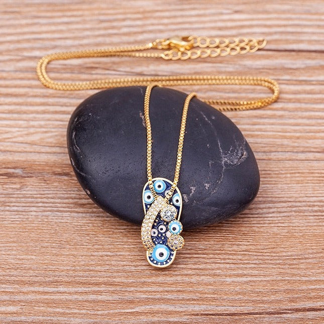 Selma Gold Necklace - Flip Flop Evil Eye Pendant