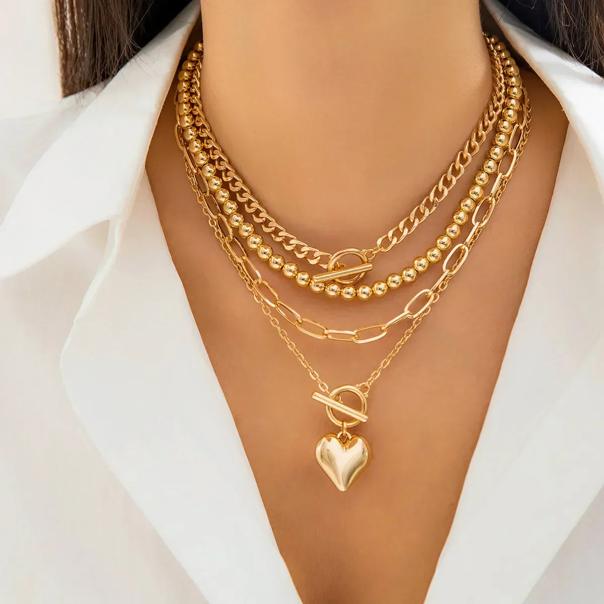 HeartGleam Necklace Set – Gold Heart Pendants