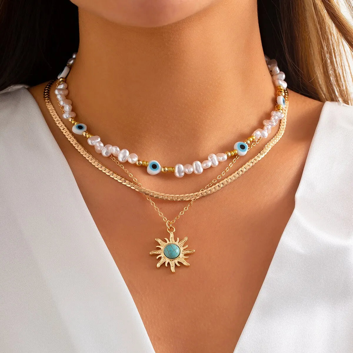 EthnoCharm Necklace Set - Sunflower and Evil Eye 3-Piece