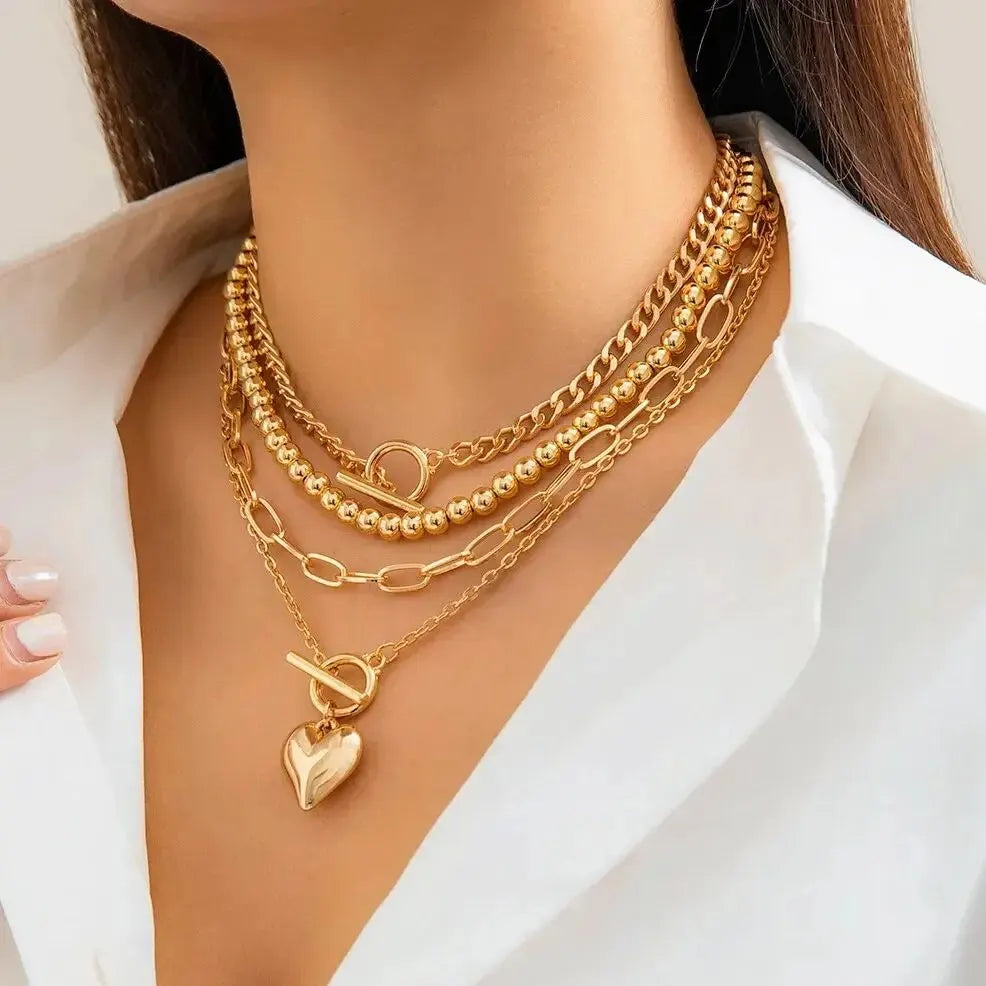 HeartGleam Necklace Set – Gold Heart Pendants